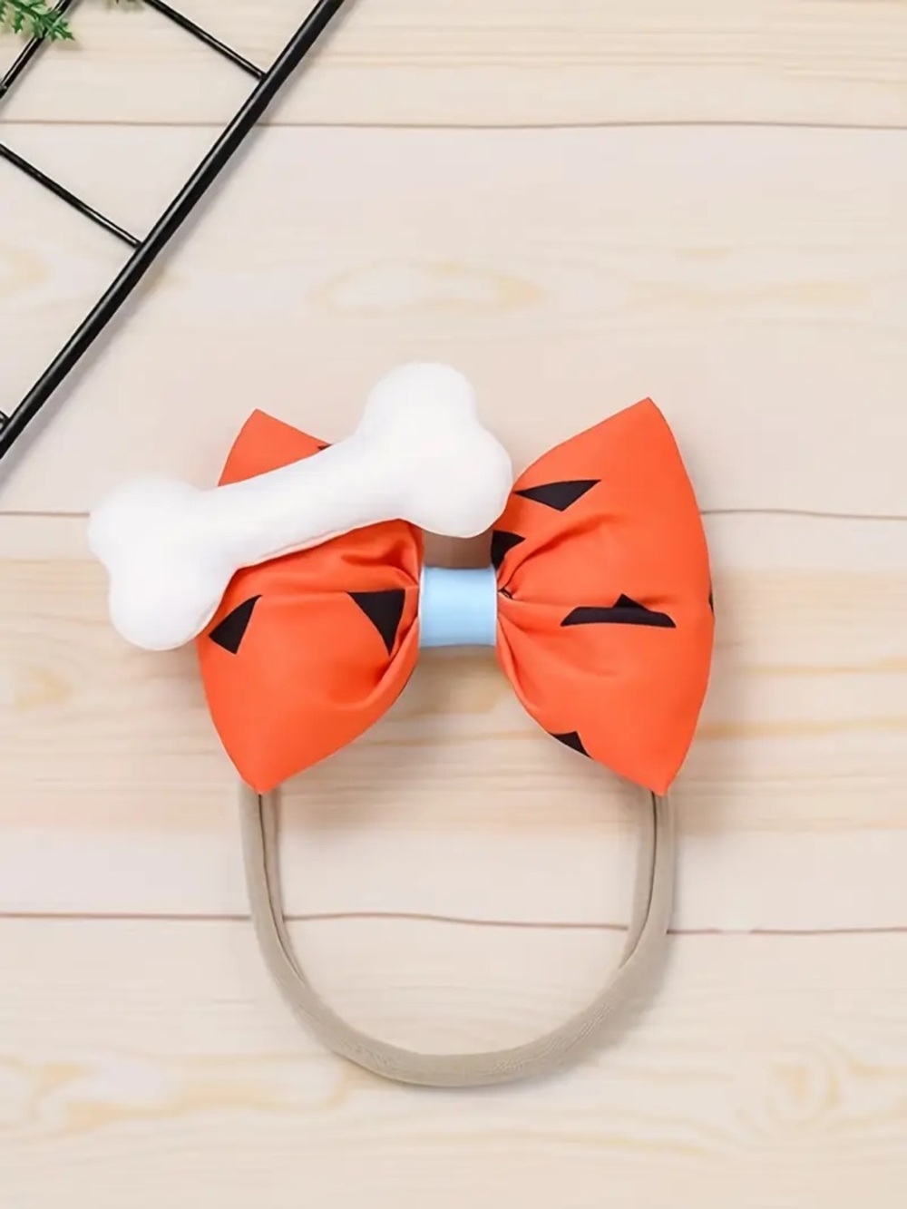 Amazon | Orange Pebbles Flintstone Themed Bow Headband